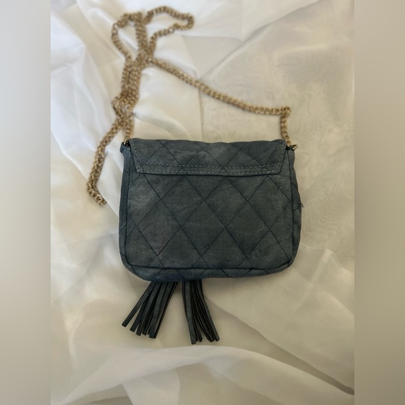 Swayed blue purse with gold colored chain. - Picture 3 of 4